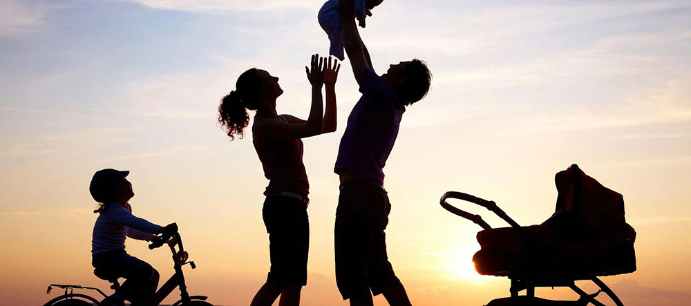 family-silhouettes-playing-with-children